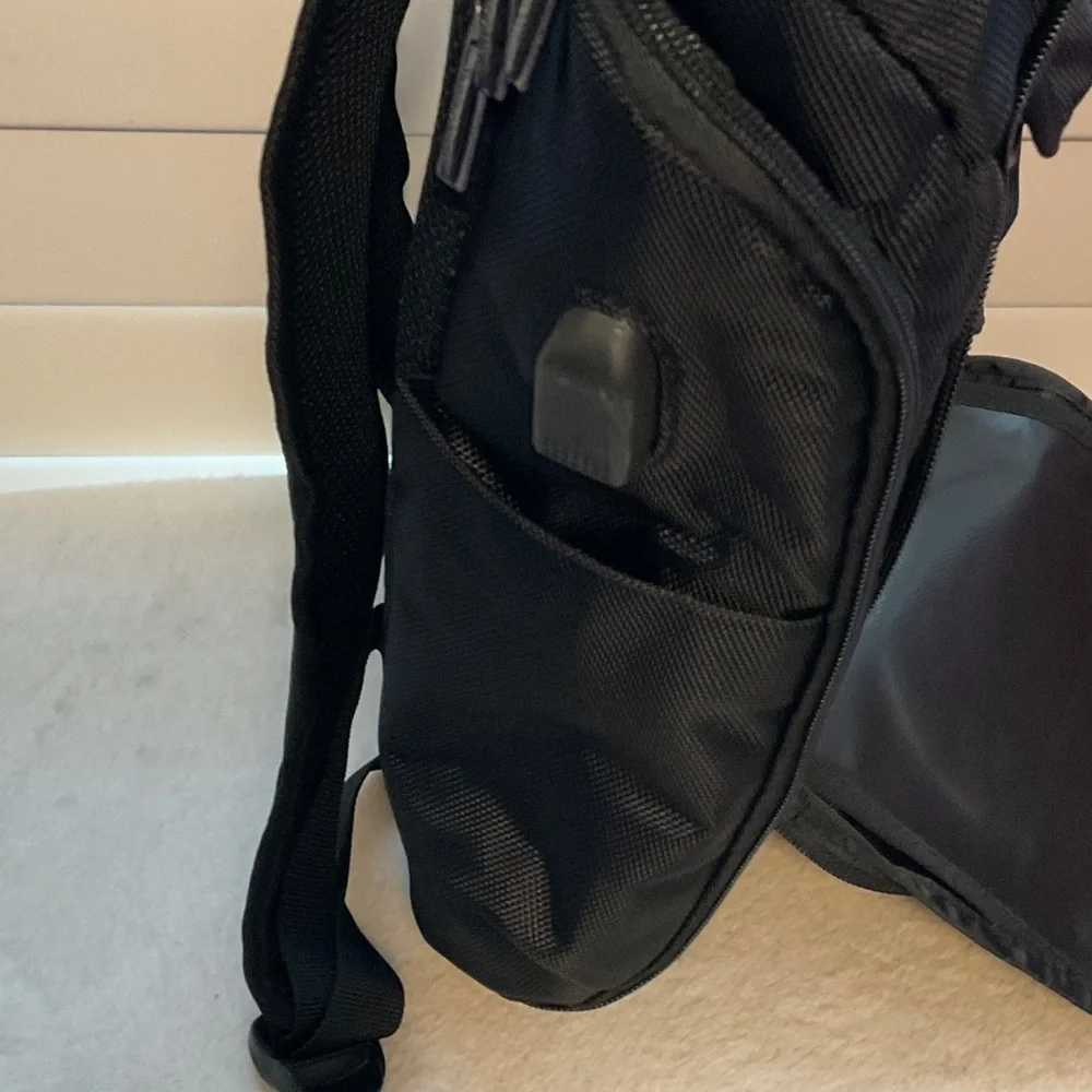 Men's Black Backpack with Colorful Wheel Design